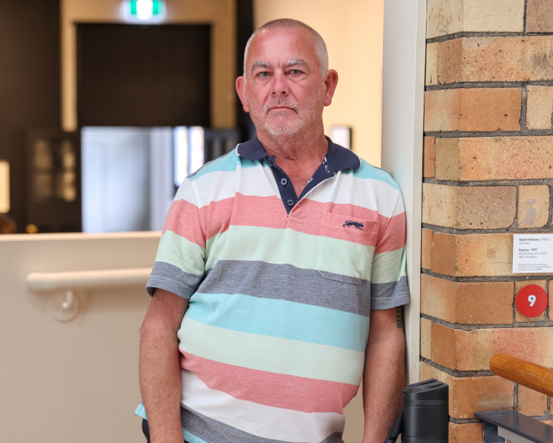 young boy wearing earphones on his ears